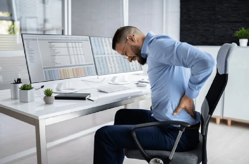 How to Adjust Your Workspace to Prevent Office-Related Back Pain